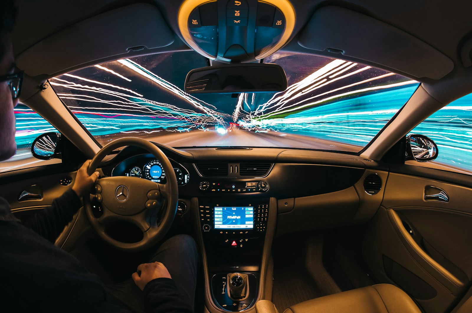 time lapse photography of man riding car, Car Security Features